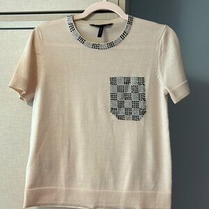 BCBGMaxAzria Cream Short Sleeve sweater Top with studded Pocket and collar.